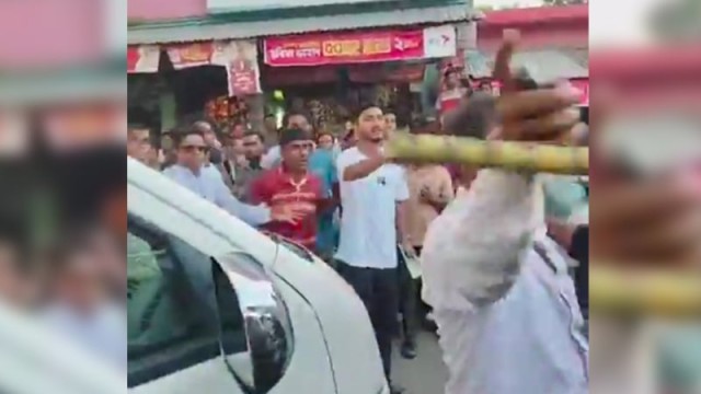 ফরিদপুরে এ. কে. আজাদের গণসংযোগে যুবদলের হামলা, গাড়ি ভাঙচুর